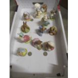 Twelve Royal Albert Beatrix Potter figurines including "Jemima Puddleduck", "Peter with