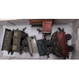 A quantity of German pre-war tinplate wagons and tinplate buffers (7)