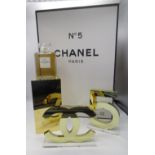 Chanel - No. 5 factice (dummy) bottle of perfume, gold acrylic display stand, gold acrylic CC