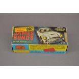 Corgi Playcraft vehicle no. 261 James Bond Aston Martin DB5 from Goldfinger, with working functions.