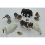 Two Royal Doulton sheepdogs, two Beswick swans, elephant, robin, two baby ducks (9)