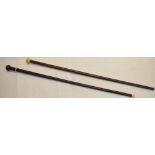 Two African Zulu knobkerries/walking sticks, one with bone knob