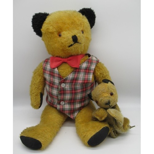 c.1940/50's Sooty teddy bear with all original features, wearing checked waistcoat and red bowtie