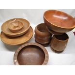 Contemporary turned walnut fruit bowl set with George VI sixpences (some missing) D31.5cm, turned