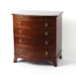 Property of a deceased estate - an early 20th century mahogany bow-fronted chest of four long