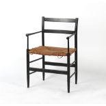 Property of a deceased estate - a late 19th / early 20th century ebonised & rush seated 'Sussex'