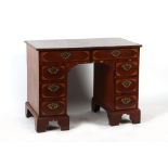 Property of a lady - a George III & later adapted mahogany & inlaid kneehole desk, 42.25ins. (