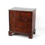 Property of a lady - an early 19th century George III/IV mahogany commode, 27.5ins. (70cms.) wide (