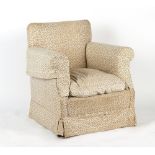 Property of a lady - an Edwardian upholstered armchair with square tapering front legs & spade feet,