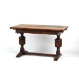 Property of a deceased estate - an oak draw-leaf refectory table, with cup & cover supports, 30.25