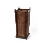 Property of a lady - an early 20th century oak & cane panelled double skinned stickstand, 29ins. (
