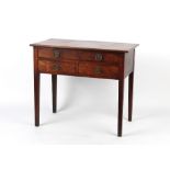 Property of a lady - an early 19th century George III/IV mahogany lowboy, with three drawers &