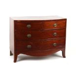 Property of a deceased estate - an early 19th century mahogany bow-fronted chest of two short &