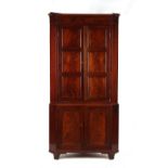 Property of a deceased estate - an early 19th century George III/IV mahogany two-part freestanding