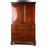 Property of a deceased estate - a George III mahogany two-part linen press, enclosing four