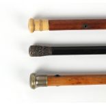 Property of a gentleman - three assorted walking canes including a late 19th / early 20th century