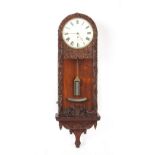 Property of a gentleman - a good quality late 19th century carved oak cased Vienna regulator type