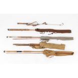 Property of a deceased estate - four assorted fishing rods including split cane examples; together