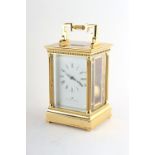Property of a deceased estate - a large good quality brass pillars cased carriage clock by Matthew