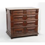 Property of a lady - a late 17th century oak chest of four long graduated drawers, 38.5ins. (98cms.)