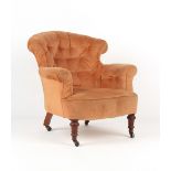 Property of a deceased estate - a Victorian button upholstered armchair, with turned front legs &