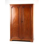 A Victorian mahogany two-door wardrobe, with fielded panels, 50.5ins. (128cms.) wide (overall).