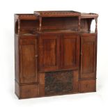 Property of a gentleman - an oak wall cabinet with open shelves above four panelled doors & four