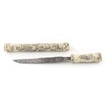 Property of a lady - a late 19th / early 20th century Japanese carved bone tanto, 13.25ins. (33.