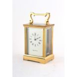 Property of a deceased estate - a Mappin & Webb brass cased carriage clock timepiece, 5ins. (12.
