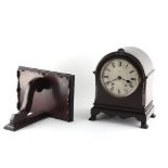 Property of a deceased estate - an early 20th century mahogany arched cased mantel clock with