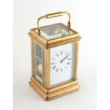 Property of a deceased estate - a late 19th century French brass gorge cased carriage clock,