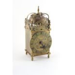 Property of a deceased estate - an early 20th century brass lantern clock timepiece, the dummy