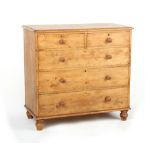A Victorian pine chest of two short & three long graduated drawers, with turned handles & feet, 41.