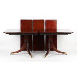 Property of a gentleman - a solid mahogany twin-pillar dining table with three extra leaves, 41.75