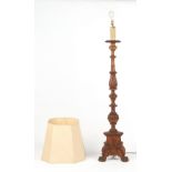 Property of a lady - a North European carved standard lamp with trefoil base, with shade.