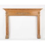 Property of a gentleman - a George III style pine fire surround, 72ins. (185cms.) wide (overall).