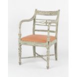 Property of a lady - a late 19th / early 20th century Regency style painted open armchair, with