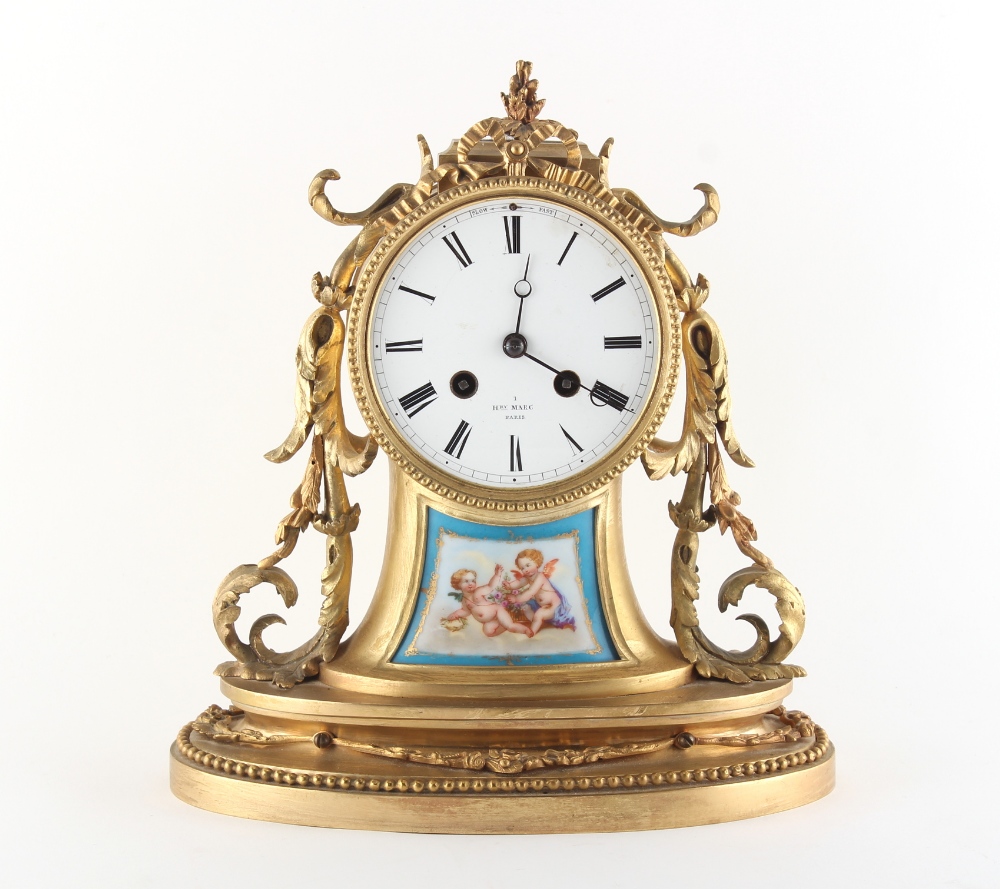 Property of a gentleman - a late 19th century French porcelain mounted ormolu cased mantel clock,