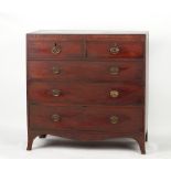 An early 19th century George IV mahogany chest of two short & three long graduated drawers, on swept