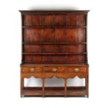 Property of a gentleman - a George III oak two-part dresser with pot board under, 65.75ins. (