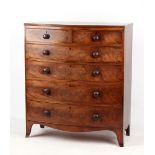 Property of a gentleman - an early 19th century mahogany bow-fronted chest of two short & four