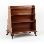 Property of a gentleman - a late Regency period mahogany double sided waterfall bookcase, with