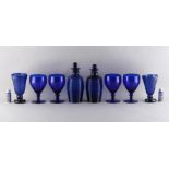 Property of a lady - a quantity of 'Bristol' blue glass items including a matched pair of spirit