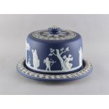 Property of a lady - an early 20th century Wedgwood blue jasperware stilton dish, 11.25ins. (28.