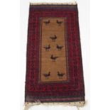Property of a gentleman - seven assorted rugs including an Afghan rug decorated with birds on a