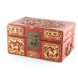 Property of a lady - a Chinese red & gilt painted mah jong set with bamboo backed bone tiles, the