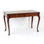 Property of a deceased estate - a late Victorian mahogany writing table with green leather inset top