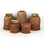 Property of a gentleman - five terracotta rhubarb forcers, three with associated wooden covers,