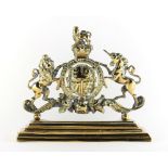 Property of a deceased estate - a Victorian brass doorstop, with Royal Coat of Arms, 11.8ins. (