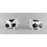Property of a gentleman - a pair of Wemyss models of pigs, with black & pink painted decorations,